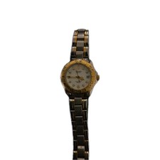 Casio DW  (707)LTD-1017 White Dial Silver/ Gold Tone Vintage.Needs a NEW battery