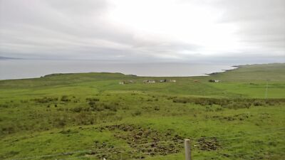 Photo 6x4 Looking across to The Minch and beyond Uig/NG3963 The distant  c2015