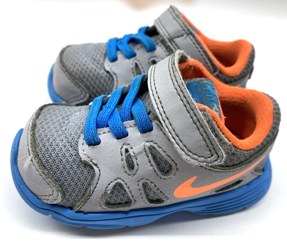 Toddler boys blue and orange nike revolution store