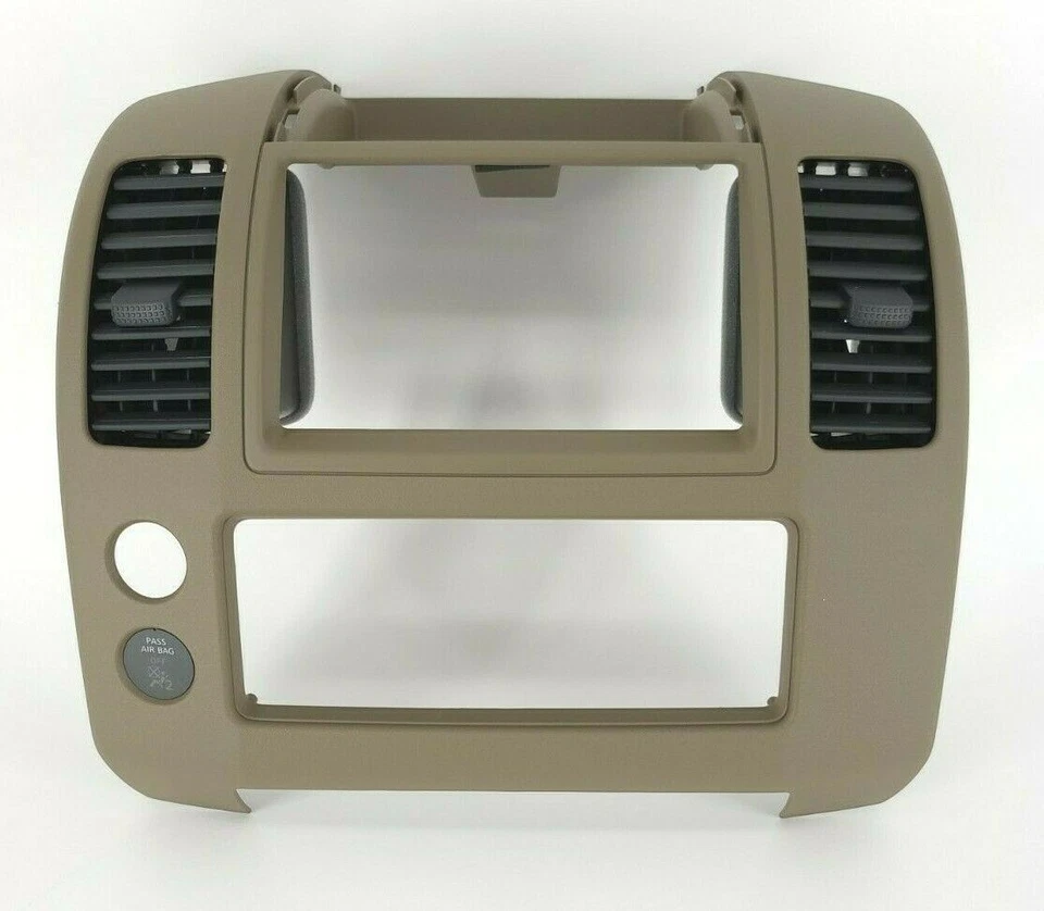 Bisel de consola central genuino OEM Nissan 68259-ZP16A bronceado con rejillas de ventilación 05-09 Frontier Foto 2 de 4