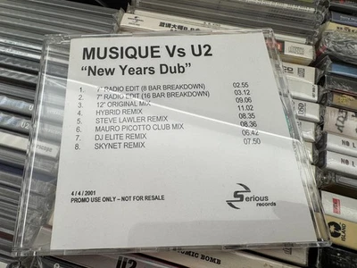 U2 : CD MUSIQUE VS U2 - NEW YEAR DUB - 8-TRACK PROMO - Bild 1 von 2