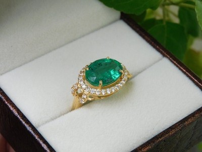 3Ct Oval Cut Simulated Emerald Women's Fancy Halo Ring In 14K Yellow Gold Plated
