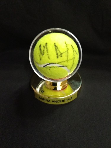 MIRRA ANDREEVA Signed New Tennis Ball in gold pedestal display