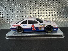 Racing Champs 1:24 scale Diecast 1 Champion 1994 Ford Thunderbird Bank w/ Case