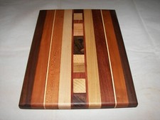 Small exotic wood cutting board 100 4329