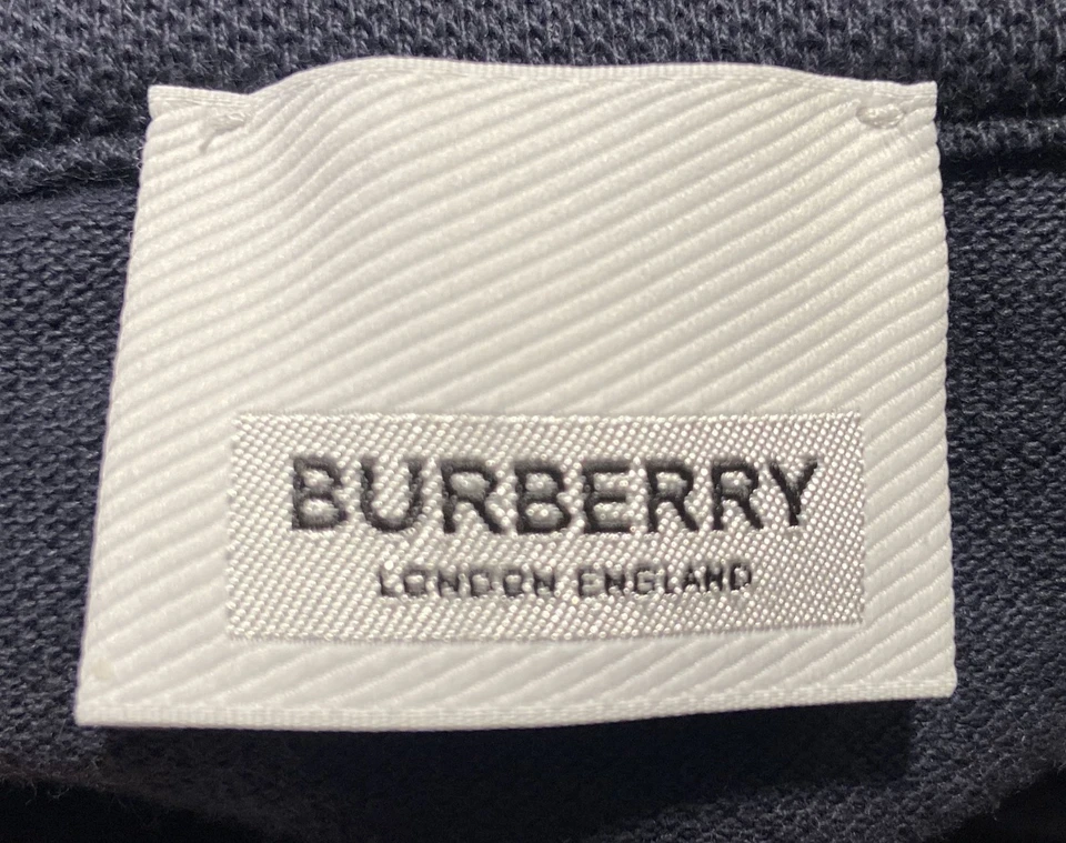 Camisa polo Burberry azul con cremallera para niño talla 4Y Foto 3 de 4