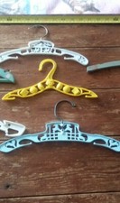 Lot of 4 vintage nursery rhyme baby hangers plastic sweet baby colors fun mixed