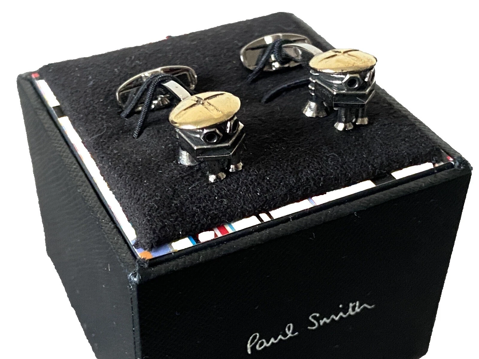 Gemelos para hombres Paul Smith Latón