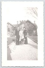 1940s Photo Of A U.S. Navy Sailor With His Family And Dog Black And White