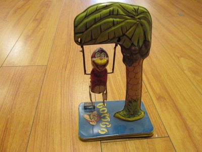 tin monkey toy