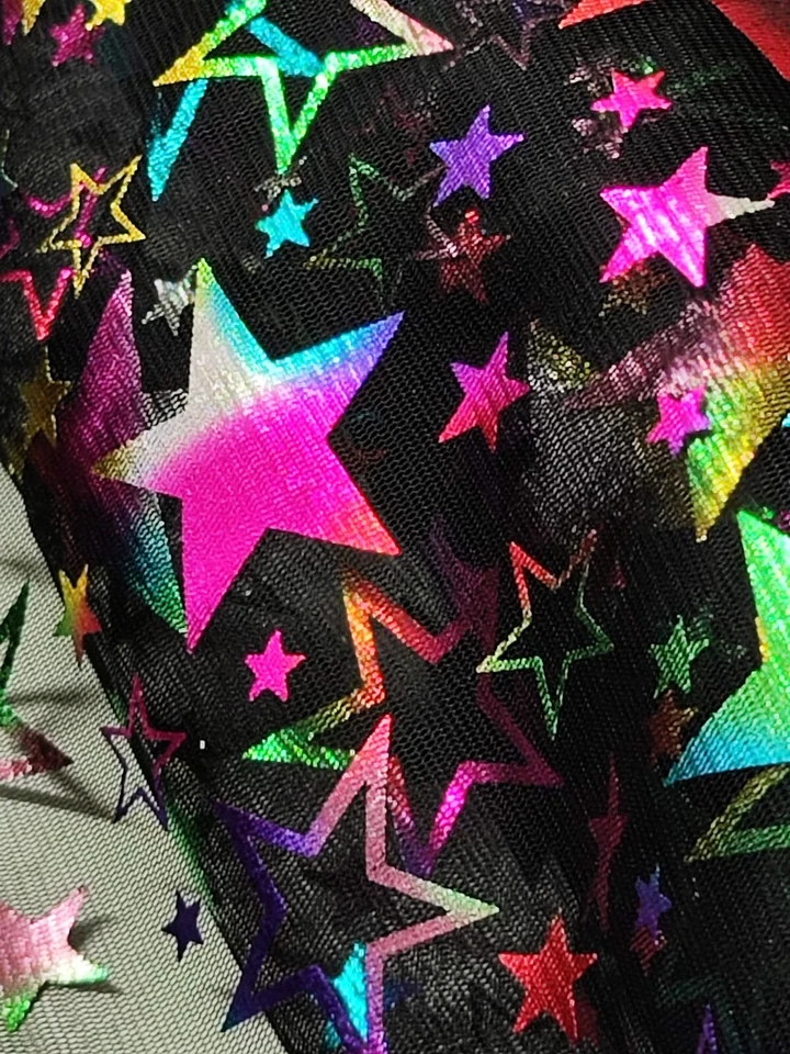 tessuto velo con stelle fluorescenti - Immagine 2 di 3