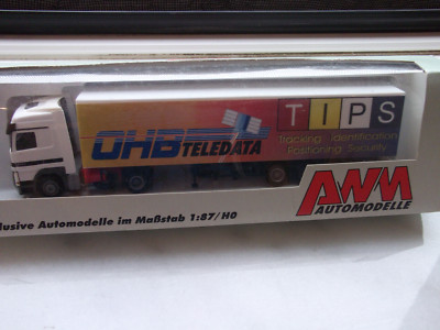 AWM MB Actros 1853 weiß Koffersattelzug '' OHB Teledata - TIPS '' mit OVP 1:87