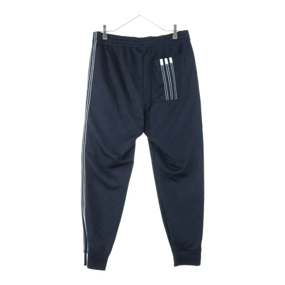 Pantalones deportivos Adidas XALEXANDER WANG Alexander con logotipo lateral negros usados Foto 2 de 4