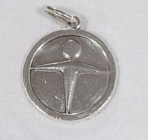 Tiffany and Co. Man Power Sterling Silver Award Pendant Charm Key Ring Unity Vtg