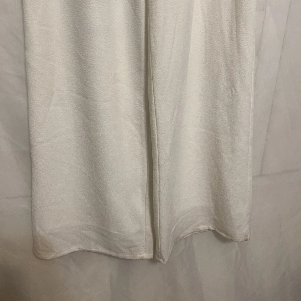 Pantalones de vestir MissGuided para mujer blancos de pierna ancha talla 0 cremallera y botón Foto 3 de 4