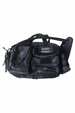 T.B.G.  Tactical Baby Gear Deuce Diaper Bag in a black camouflage pattern.