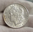 1887 US Morgan Silver Dollar $1 AU (Cleaned)
