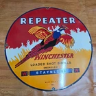WINCHESTER REPEATER PORCELAIN ENAMEL SIGN 29 X 29 INCHES