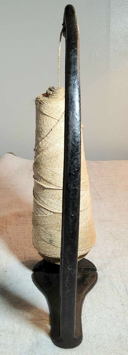Antique Cast Iron String Holder