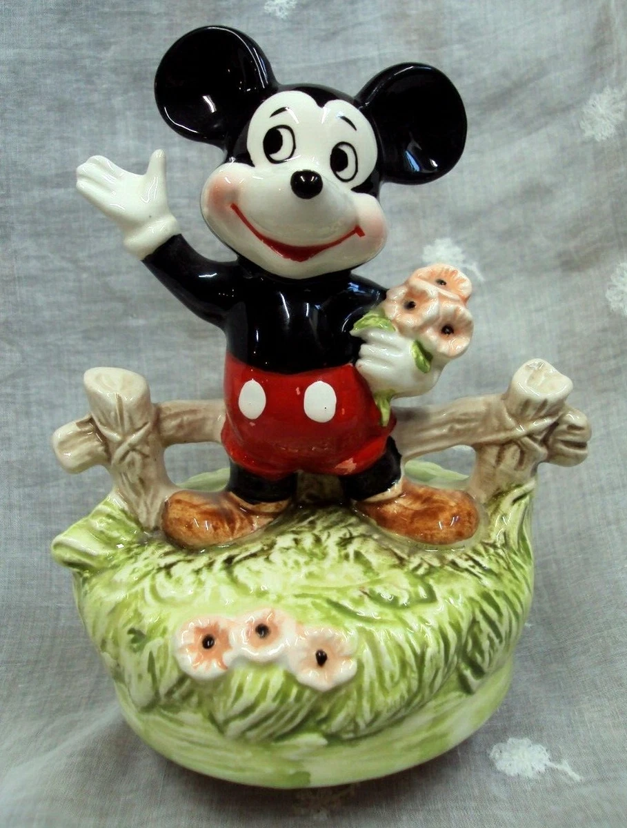 Mickey Mouse Holding Flowers