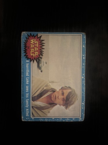 1977 Topps Star Wars #26 A horrified Luke sees his family killed — Raw