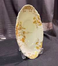 Art Deco vegetable plater Deca J P L  white and gold ceramic with scalloped rim.