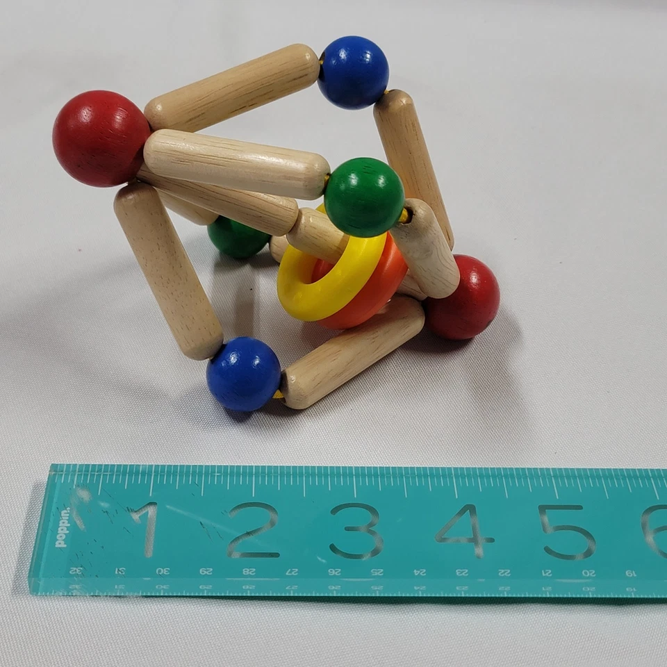 Anillo de cuentas de juguete de madera para bebé Wonderworld mordedor de dentición agarre natural Foto 4 de 4