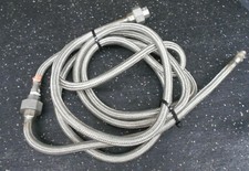 BRAIDED SS FLEXIBLE HOSE APPROX 134" LENGTH OD 0.5" W/ .25" NPT CONNECTIONS