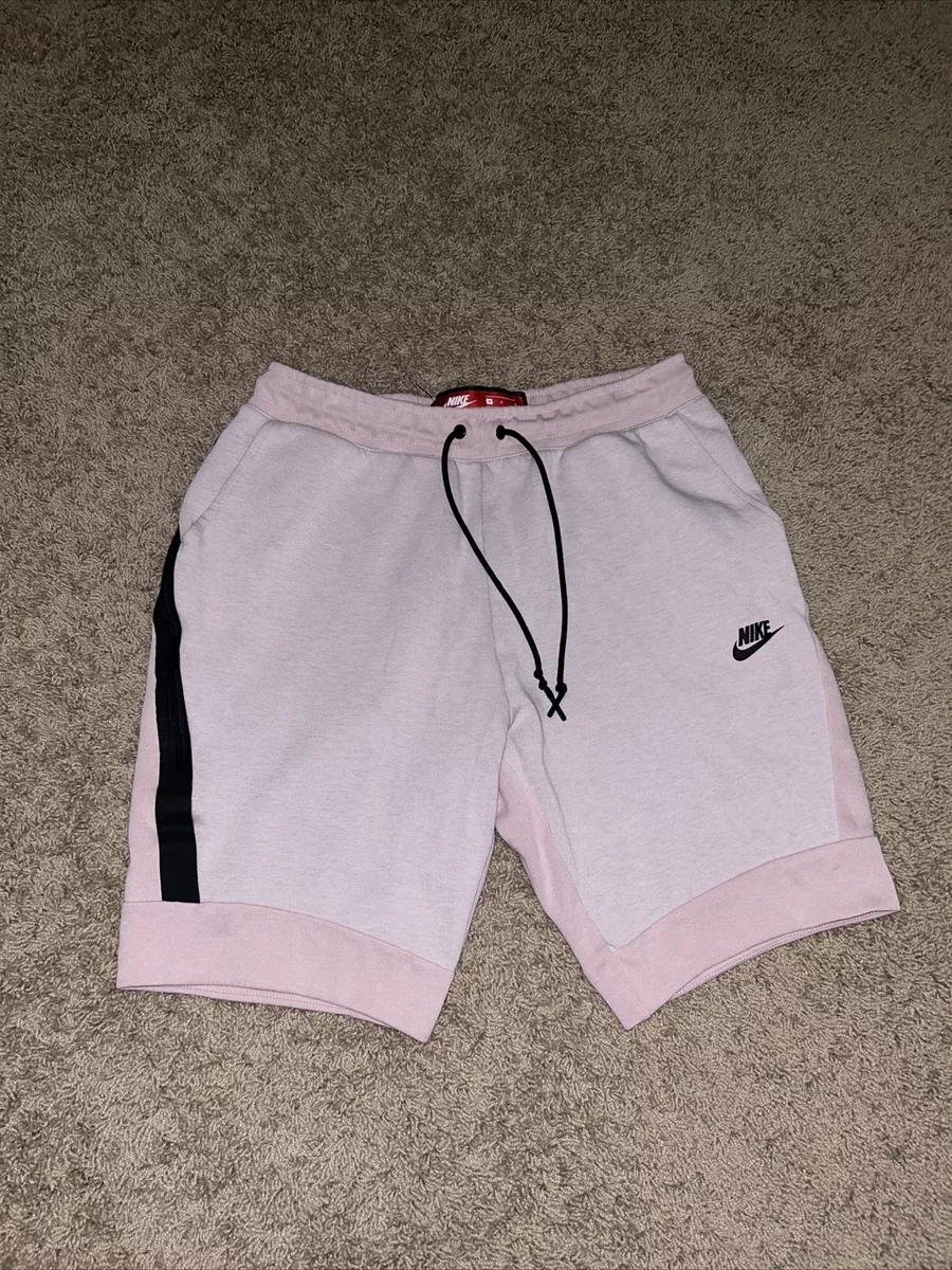 Pink nike tech fleece deals shorts