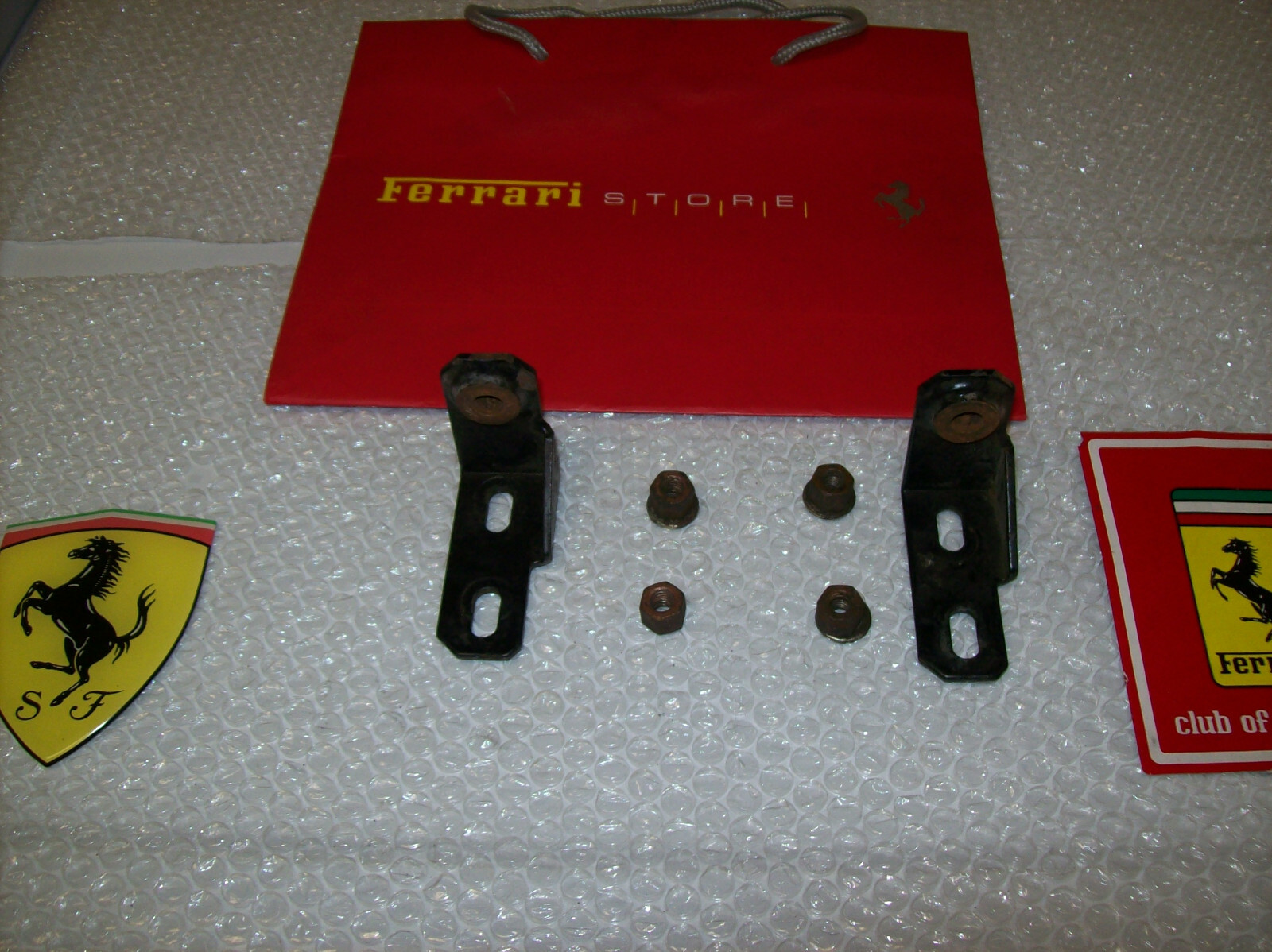 308 Gts Ferrari Exhaust Bracket with  bolts is Oem Part.