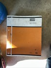 580 Super E Loader Backhoe Service Manual — photo 2