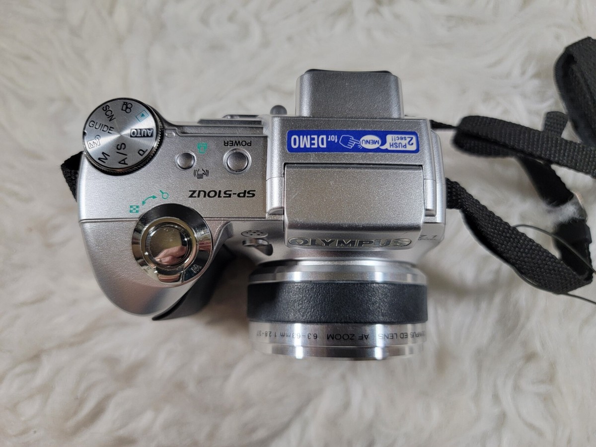 Olympus SP-510UZ Ultra Zoom 7.1MP Digital Camera with 10x
