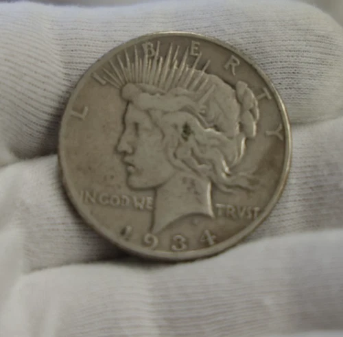 1934 S US Peace Silver Dollar $1 Fine (Cleaned,Rim Nick)