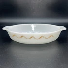 New ListingVintage PYREX Pixie 700 Yellow Ribbon Scroll Au Gratin Casserole Dish HTF