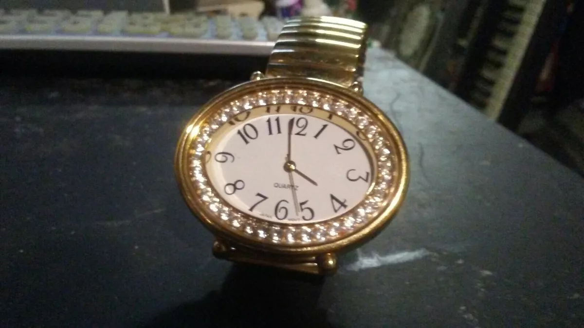 LADIES AVON Oval Stone Face GOLD Stretch Band WATCH Running eBay