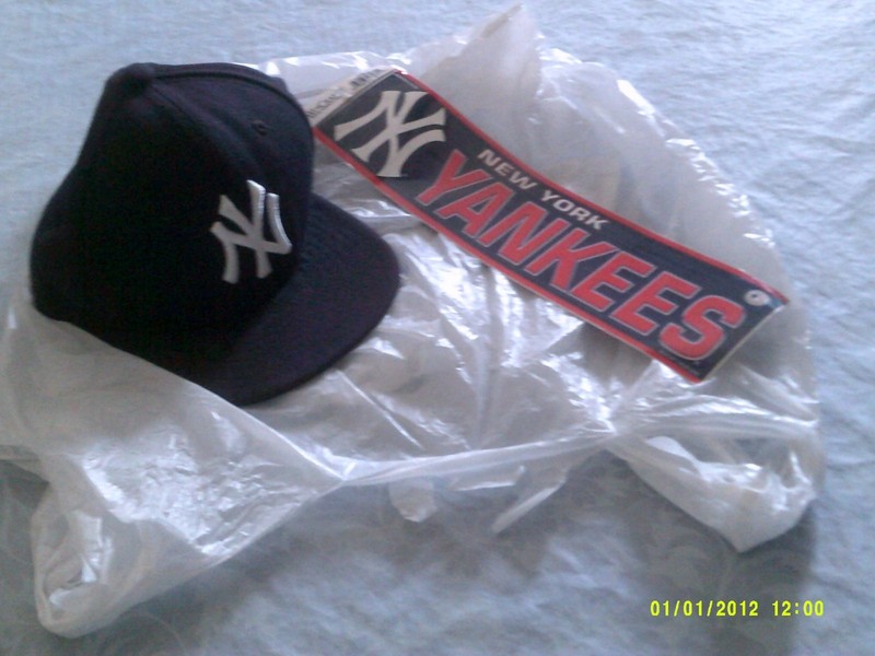 NY Yankess baseball cap and bumper sticker