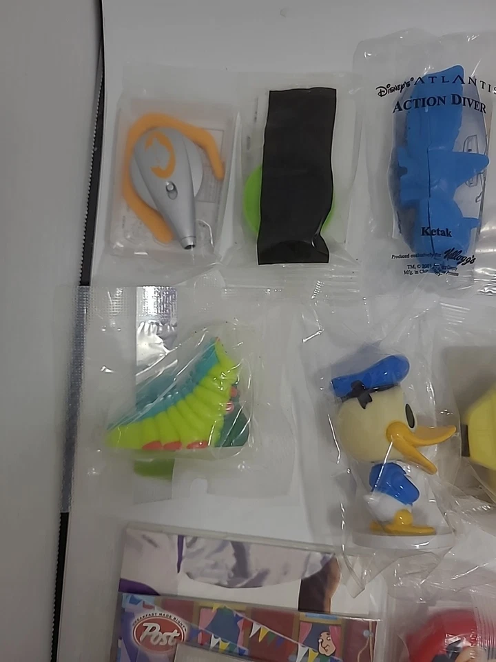 LOTE MIXTO DE COLECCIÓN DE 50 PRIMAS/JUGUETES DE CEREALES SELLADOS Kellogg’s-Disney Etc. ++ Foto 2 de 4