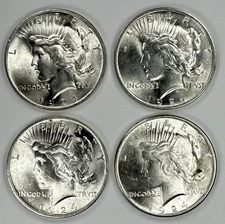 Lot of 4 1922-1935 90% Silver Peace American Dollars - Uncirculated Mixed Dates
