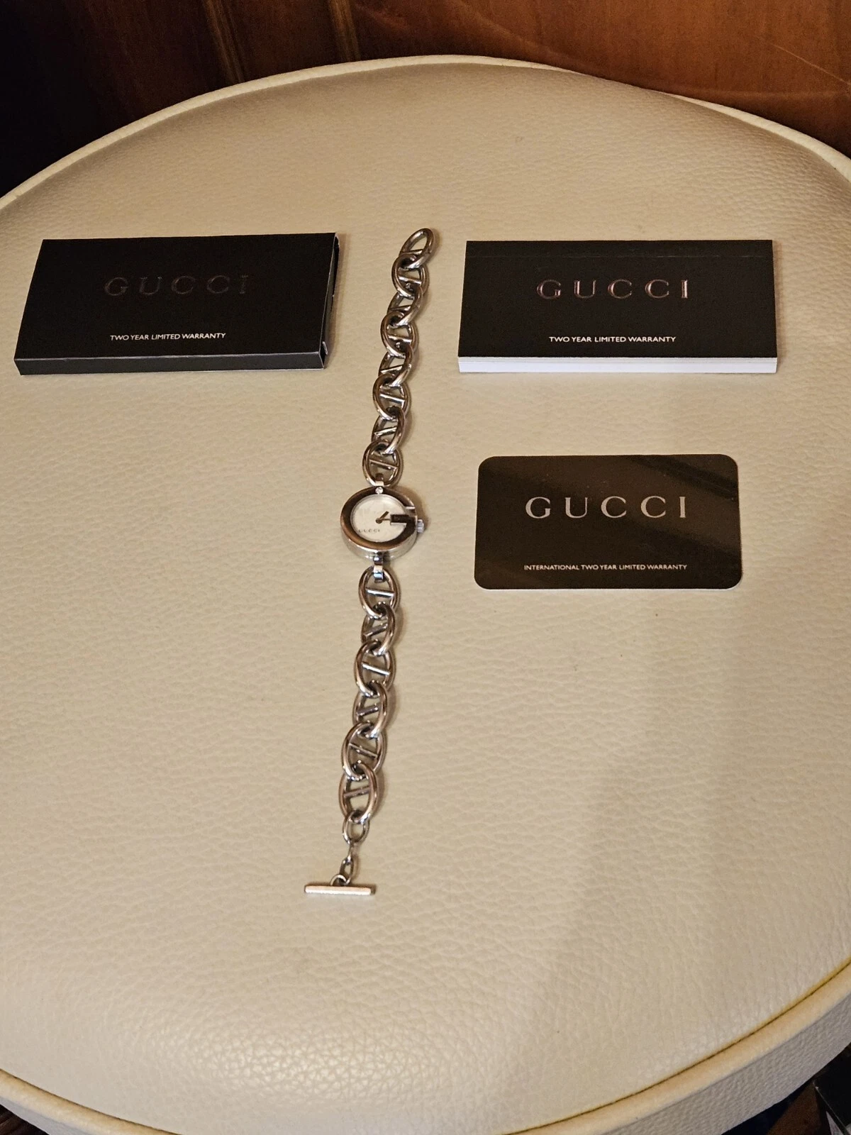 Montre bracelet femme Gucci 107 diamant véritable MOP 