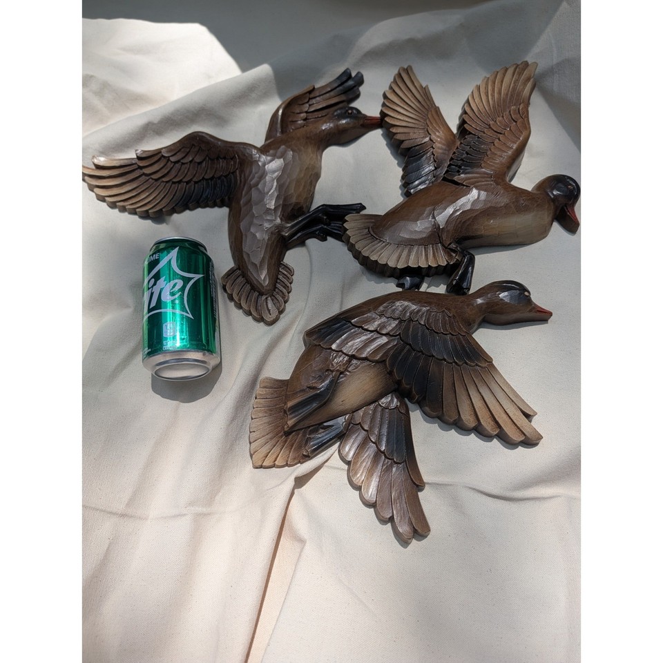 An original 1961 set of three Syroco flying mallard ducks — the quintessential MCM wall icon, fully intact and period-correct.