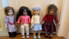 10 Pre-Owned American Girl Dolls with clothes...
