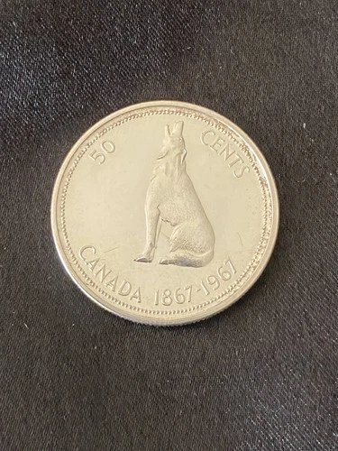 1967 Canadian Howling Wolf 50 Cent Piece. Uncirculated. 80% Silver Coin.