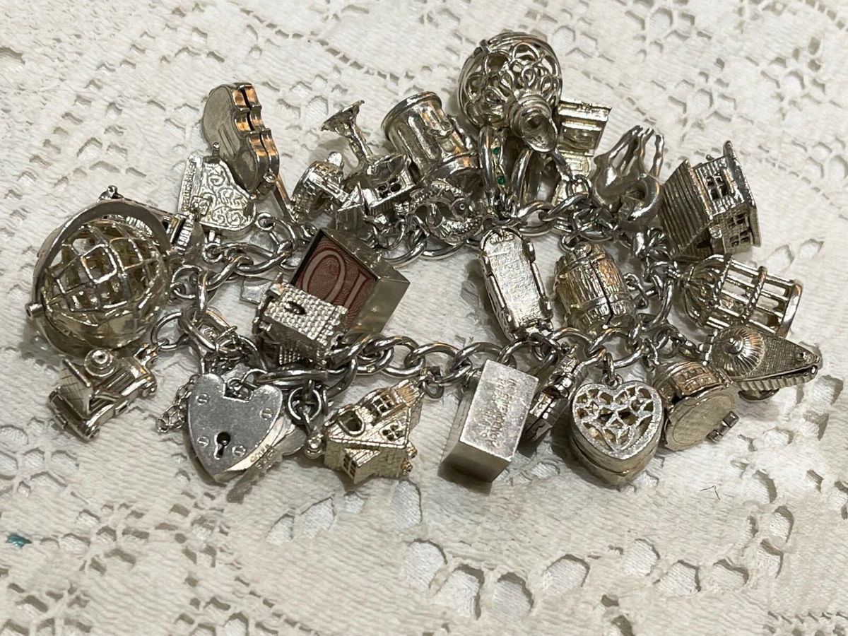 stunning heavy vintage sterling silver charm bracelet nuvo etc