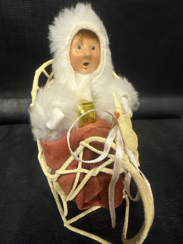 Byers' Choice Child in White Sleigh (Dove Sled) with Coat, Blanket