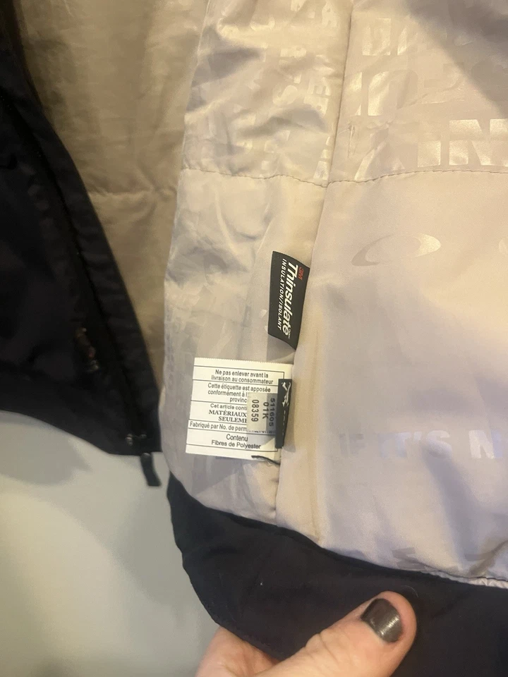 Chaqueta para mujer Oakley impermeable Thinsulate negra pequeña para mujer Foto 3 de 4