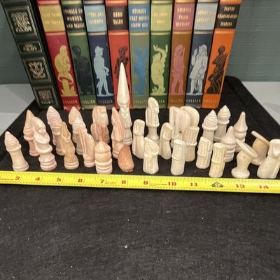 Game Pieces?  Chess? Marble? Onyx?  Alabaster? Cold and Heavy