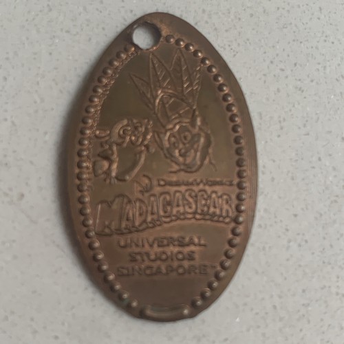 UNIVERSAL STUDIOS Madagascar Singapore Retired Elongated Pressed Copper