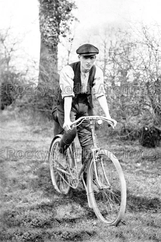 eyy-5 Social History, Early Cyclist with Bicycle. Photo