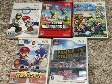 Mario Kart Wii Set with 4 Nintendo Wii Games - Negotiable Price
