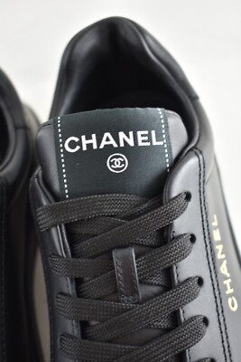 Chanel 23A Black Calfskin Leather Gold CC Logo Flat Runner Trainer